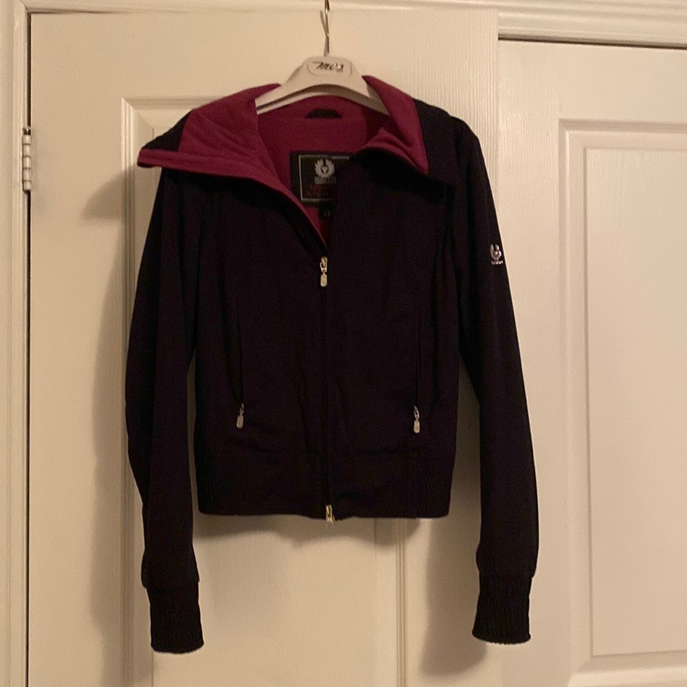 Women’s spring/fall light waist length jacket. Fuschia/purple fleece lining.